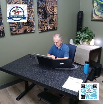 Marcelino Dodge, owner of Cash Tracks Financial Colorado Springs at work in his office.